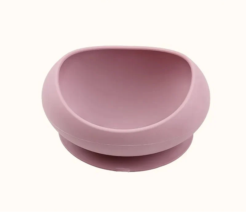 Gamelle en silicone avec ventouse rose pour chat et petit chien, antidérapante et stable.