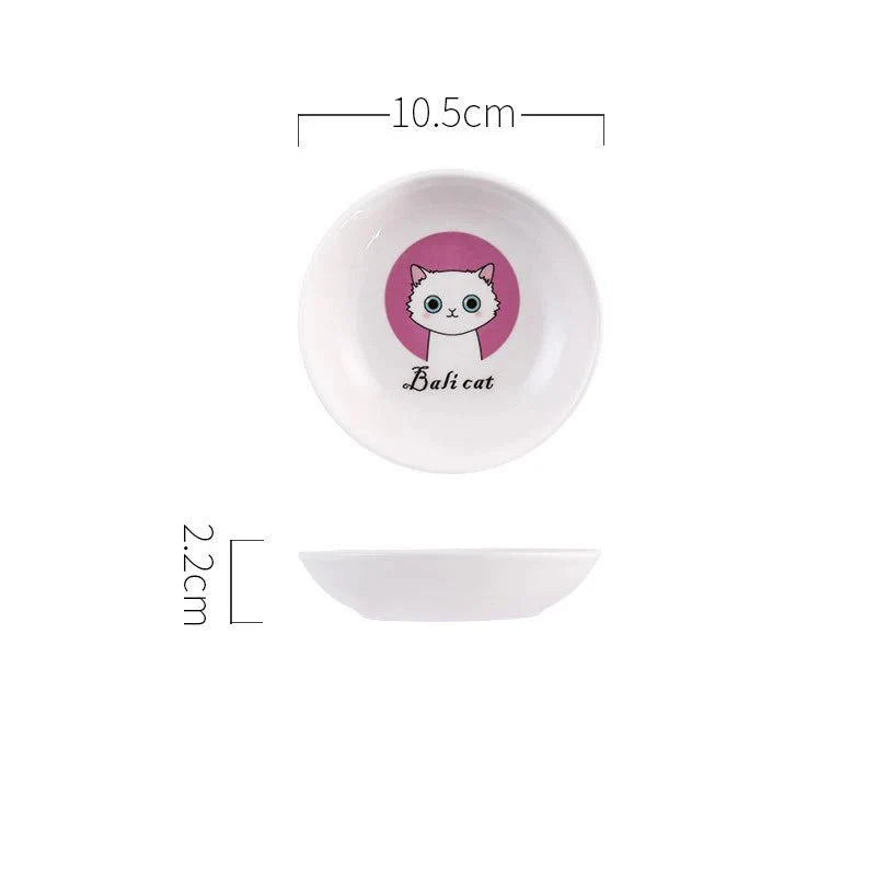 Assiette en céramique pour chat avec illustration de chat blanc sur fond rose et dimensions 10,5 cm