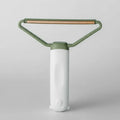 Brosse attrape poils chat et chien Oscar et Plume avec manche ergonomique vert clair