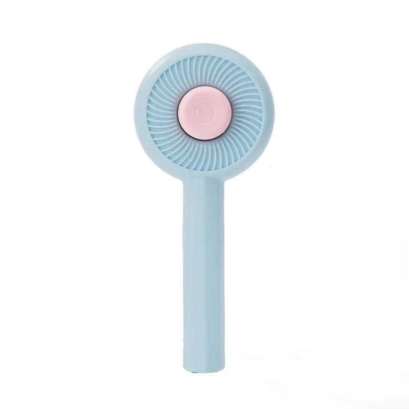 Brosse poils chat bleue de Oscar et Plume avec design compact et forme ronde pour un toilettage efficace