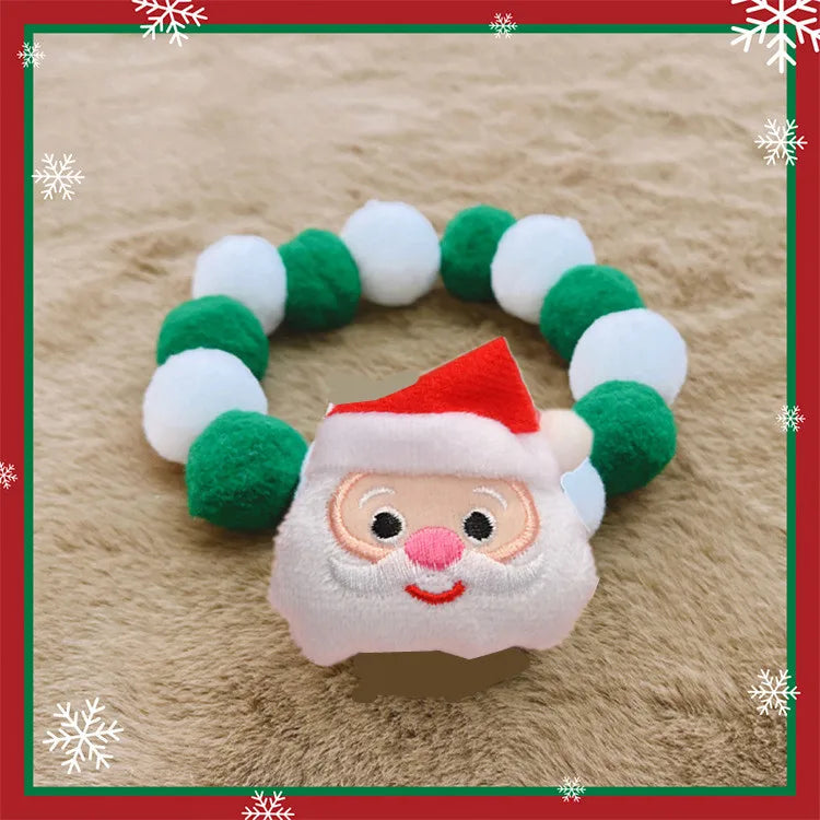 Collier de Noël pour chat et chien avec un motif de Père Noël et des pompons colorés