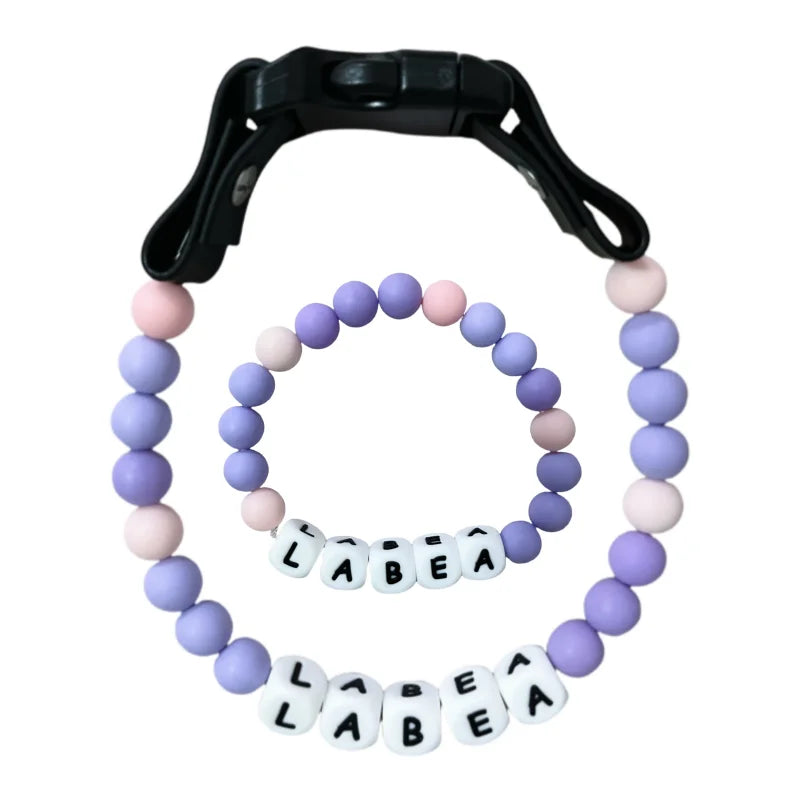 Collier pour chien Oscar et Plume en perles violettes et roses avec clip noir et bracelet assorti