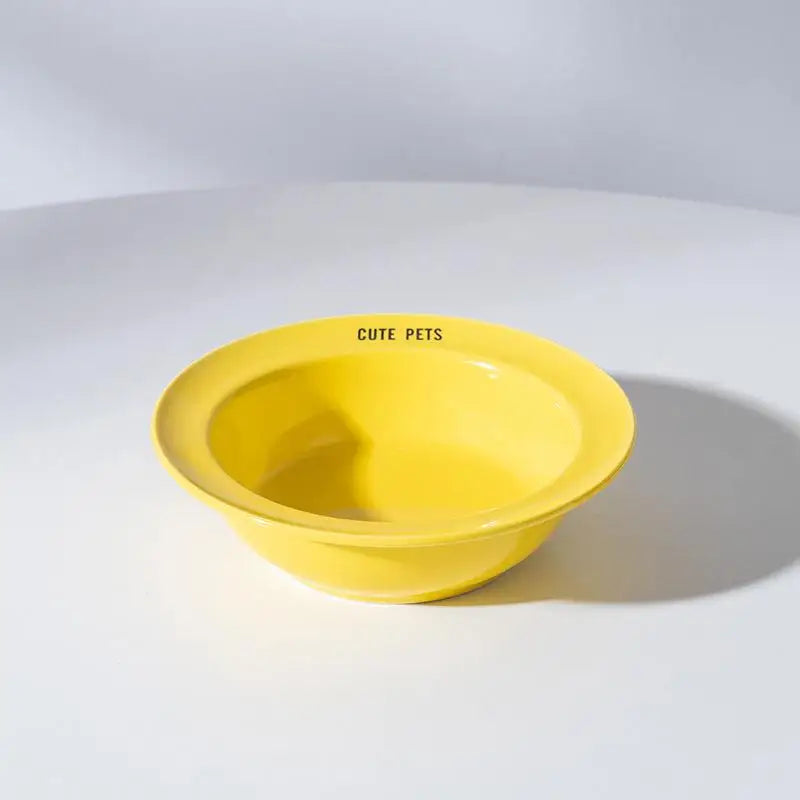 Gamelle céramique surélevée chat jaune de Oscar et Plume avec inscription Cute Pets