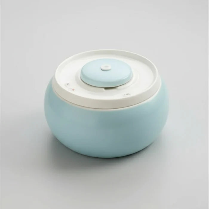 Fontaine à eau pour chat design bleue et blanche Oscar et Plume à poser pour animaux domestiques
