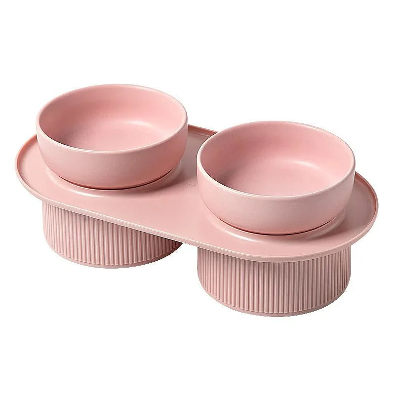 Gamelle et support pour chat en plastique rose avec deux bols ronds surélevés