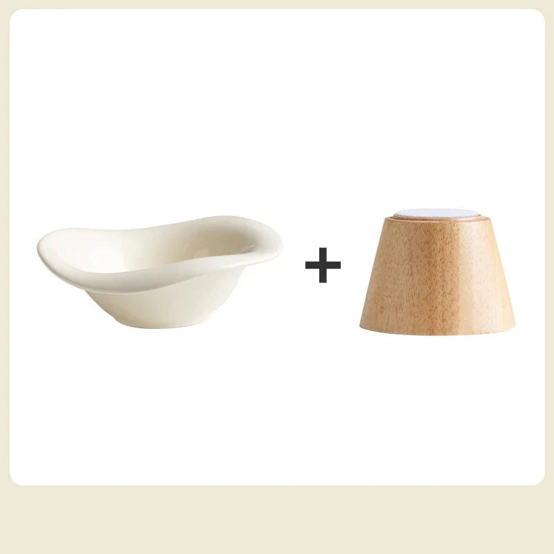 Gamelle surélevée pour chat avec parfum élégant en céramique et support en bois naturel.