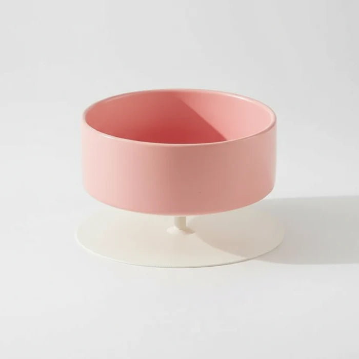 Gamelle surélevée pour chat en rose avec base blanche pour un meilleur confort lors des repas