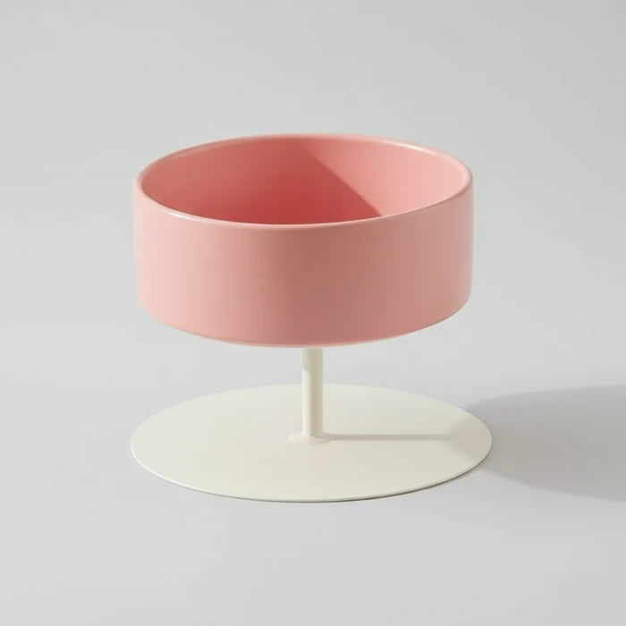 Gamelle surélevée pour chat en rose avec socle blanc pour un confort félin optimal