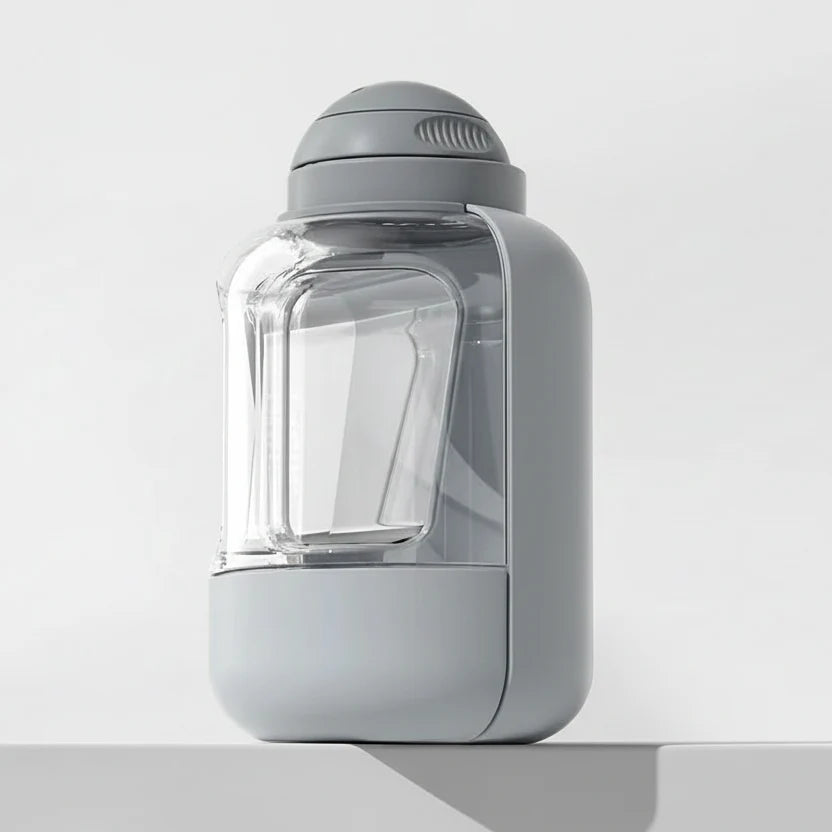 Gourde de voyage pour chien Oscar et Plume en gris avec compartiment pratique pour l'eau