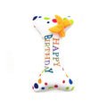 Jouet anniversaire pour chien en forme d'os blanc avec pois colorés et inscription Happy Birthday
