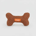 Jouet sonore pour chien en forme d'os de couleur marron pour le divertissement des animaux