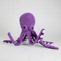 Jouet sonore pour chien en forme de pieuvre violette avec tentacules texturés