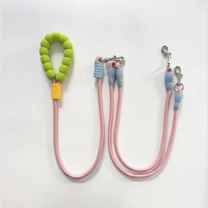 Laisse double pour chien avec poignées en silicone vertes et cordes roses pour une promenade confortable
