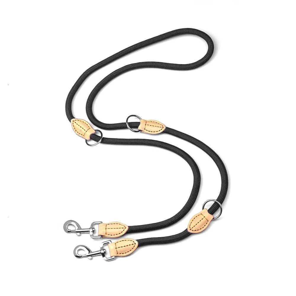 Laisse mains libres pour chien noire avec attaches métalliques et finitions en cuir beige