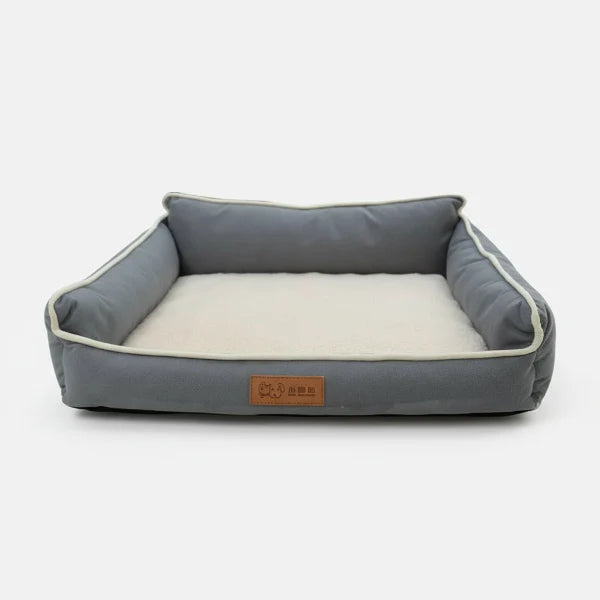 Panier chien confortable gris avec coussin beige et contours rembourrés par Oscar et Plume