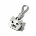 Porte-clés chien en cuir gris et blanc avec cordon boucle et visage de chien stylisé