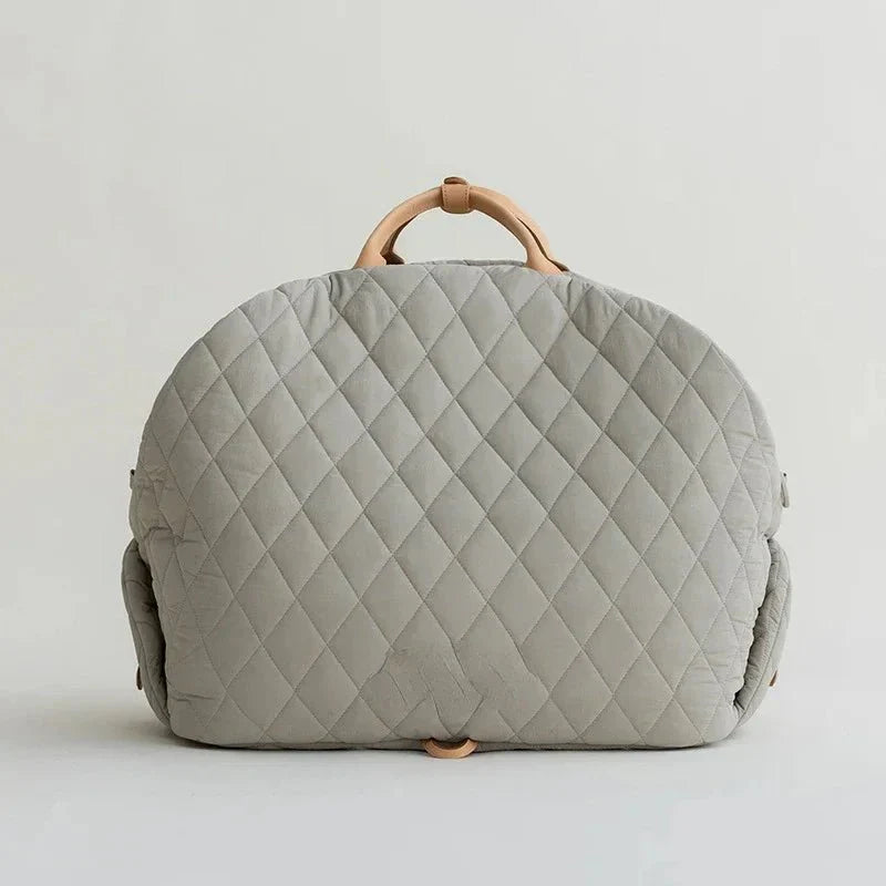 Sac de transport pour chien Oscar et Plume avec design matelassé et poignées en simili cuir