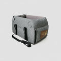 Sac transport chien design en gris avec des poignées et une base rembourrée pour le confort de votre animal