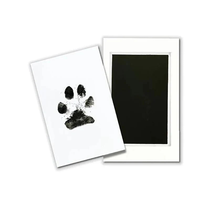Tampon empreinte patte chien avec fond noir pour des souvenirs d'animaux de compagnie