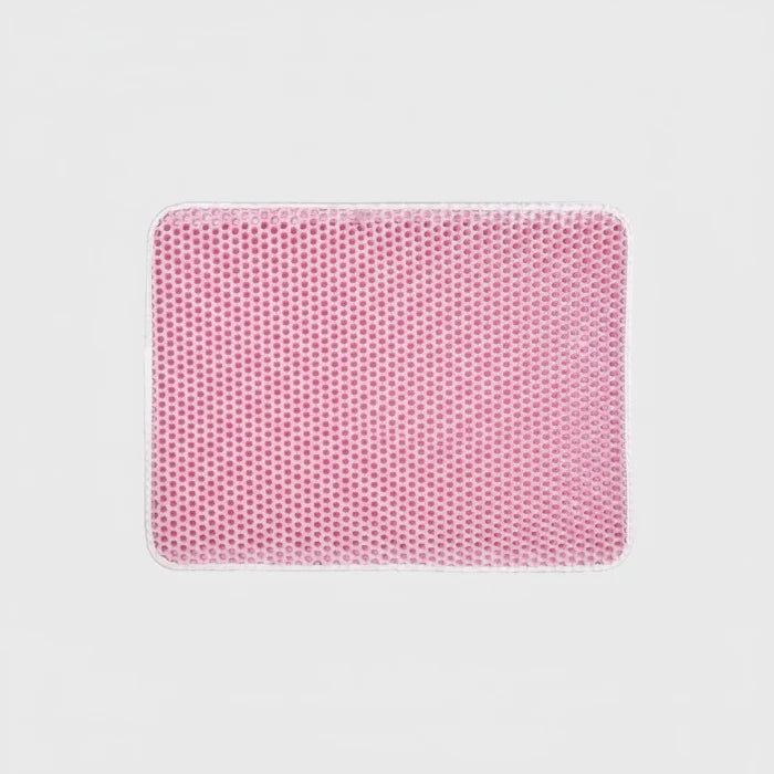 Tapis litière chat rose en matériau alvéolé pour récupération efficace de la litière