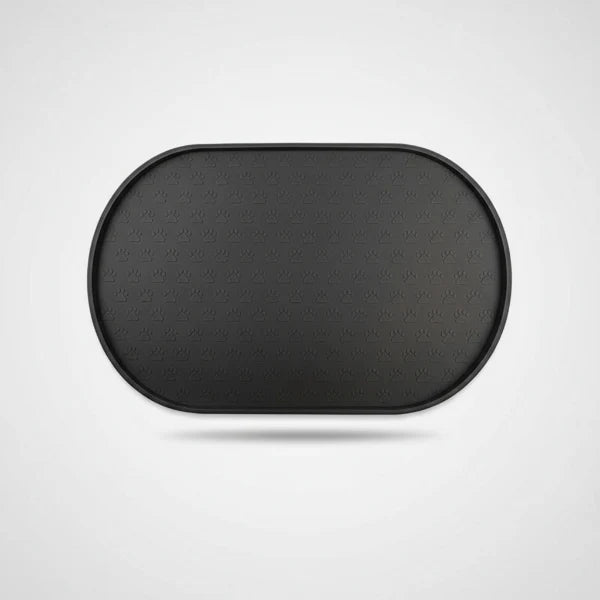 Tapis silicone gamelle chien noir ovale avec motifs pattes pour protéger le sol lors du repas