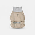 Veste imperméable chien beige avec col rembourré et ceinture ajustable pour protéger votre animal des intempéries